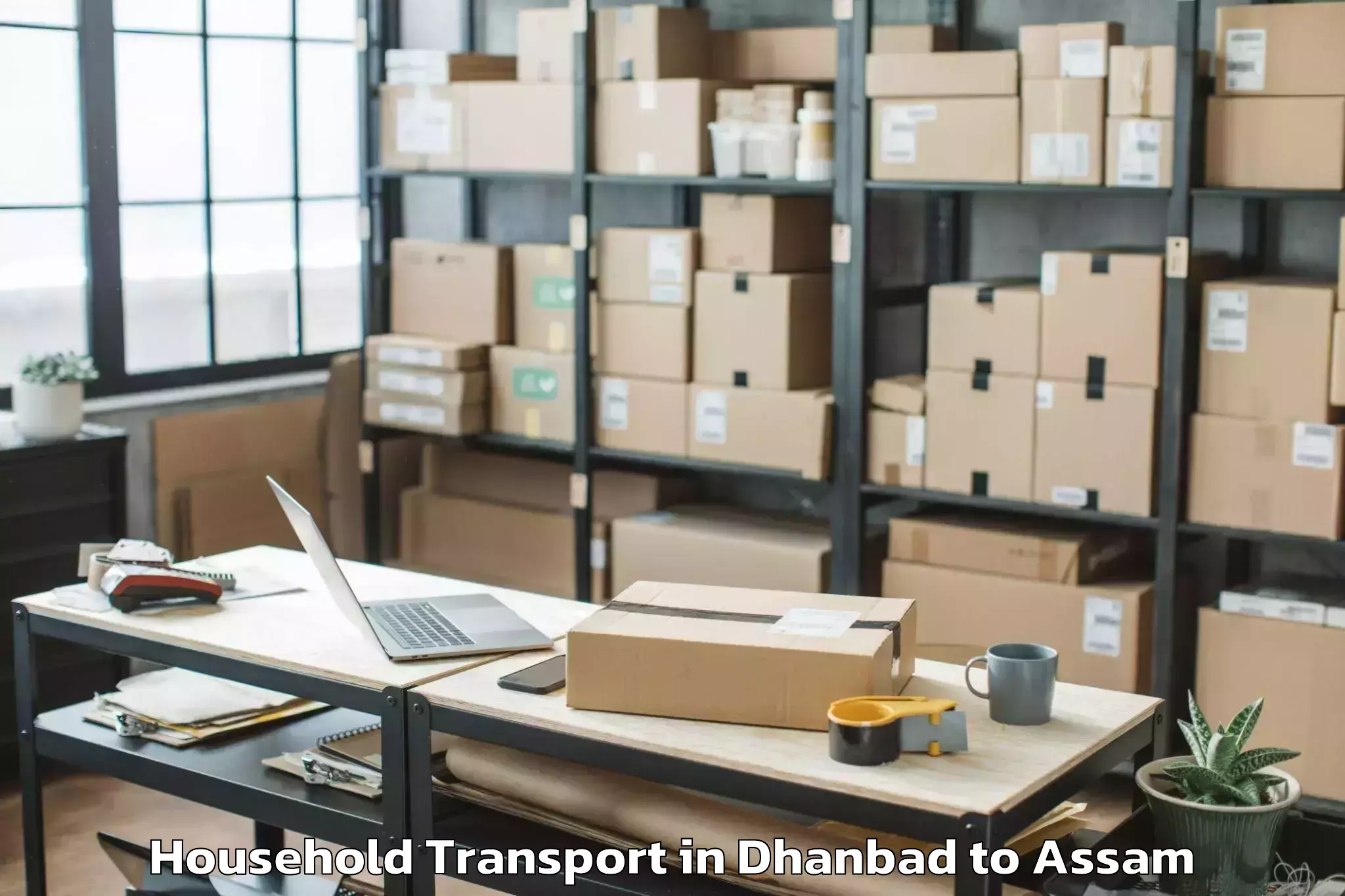 Easy Dhanbad to Borjhar Airport Gau Household Transport Booking